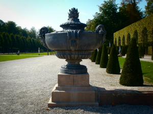 large concrete planters in a garden